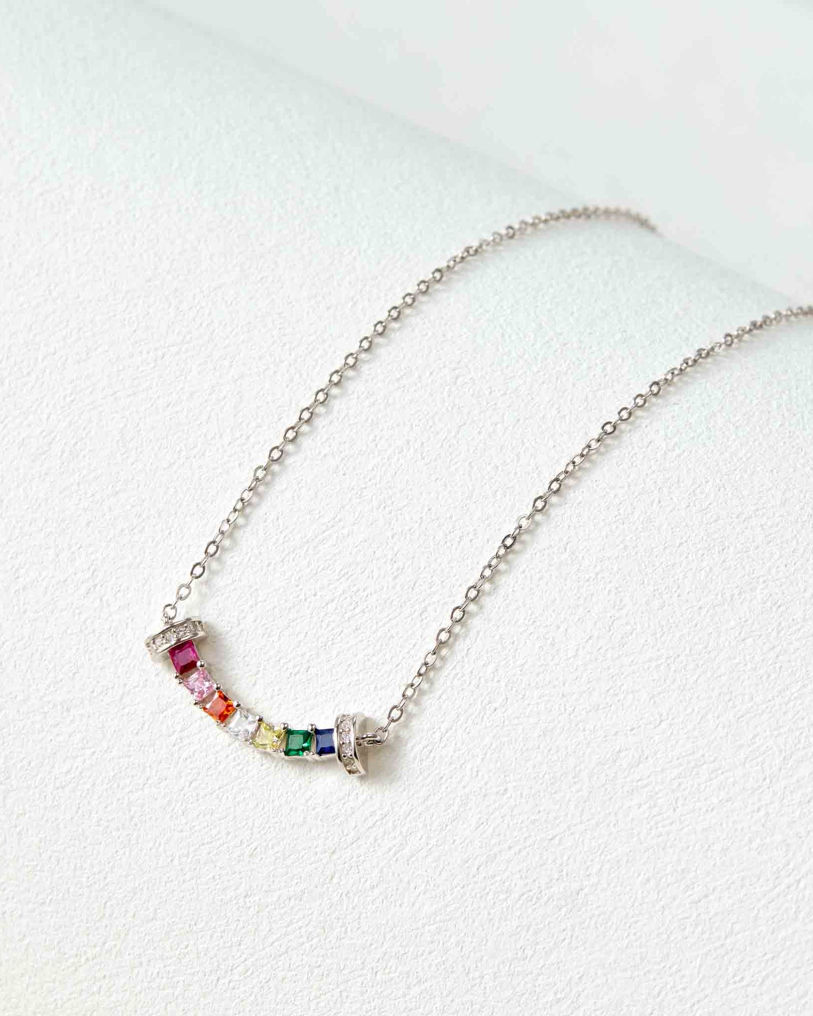 Necklace with colorful beads on a white background