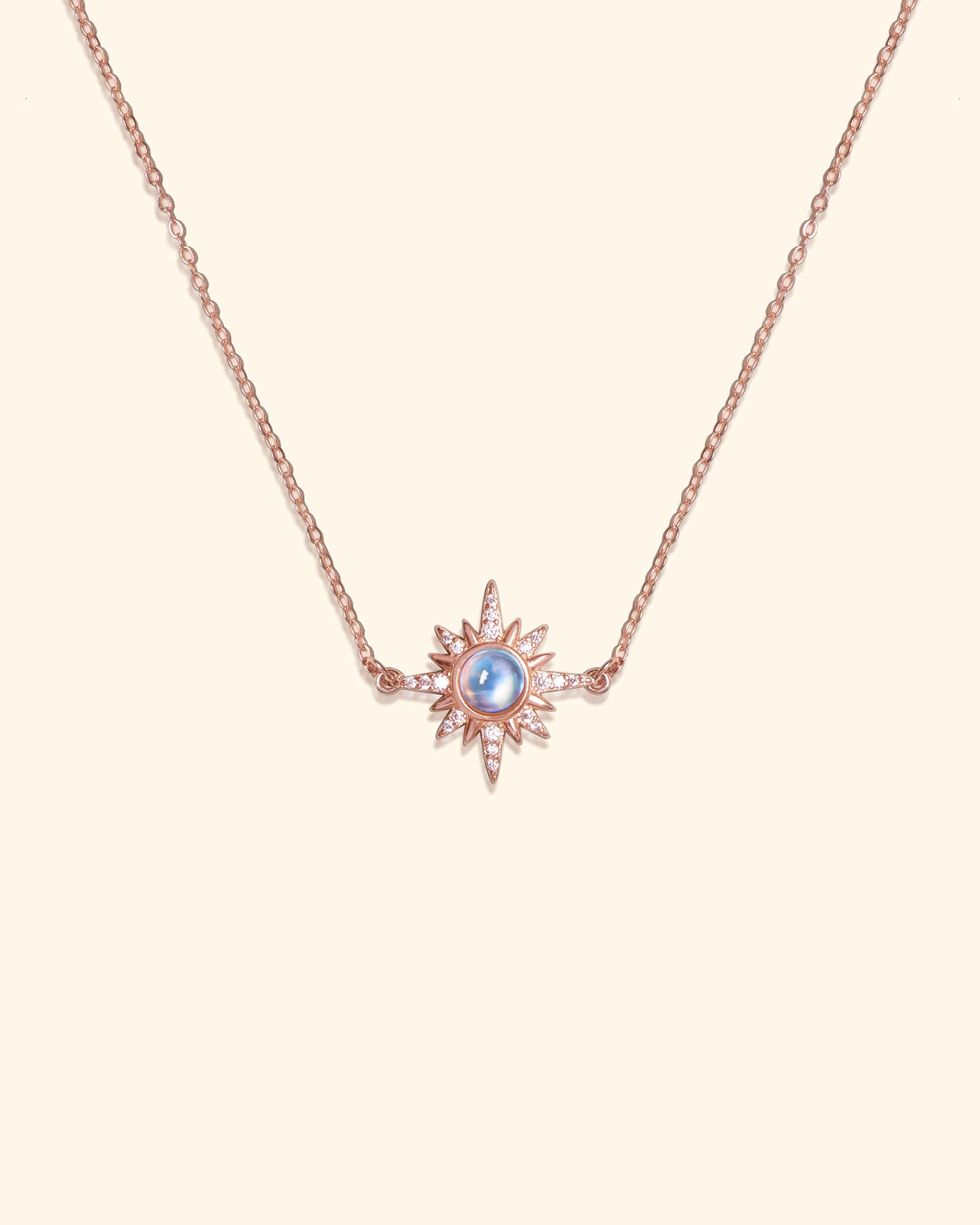 Choodo 925 sterling silver classical sun pendant necklace with natural moonstone on cream background, rosegold color