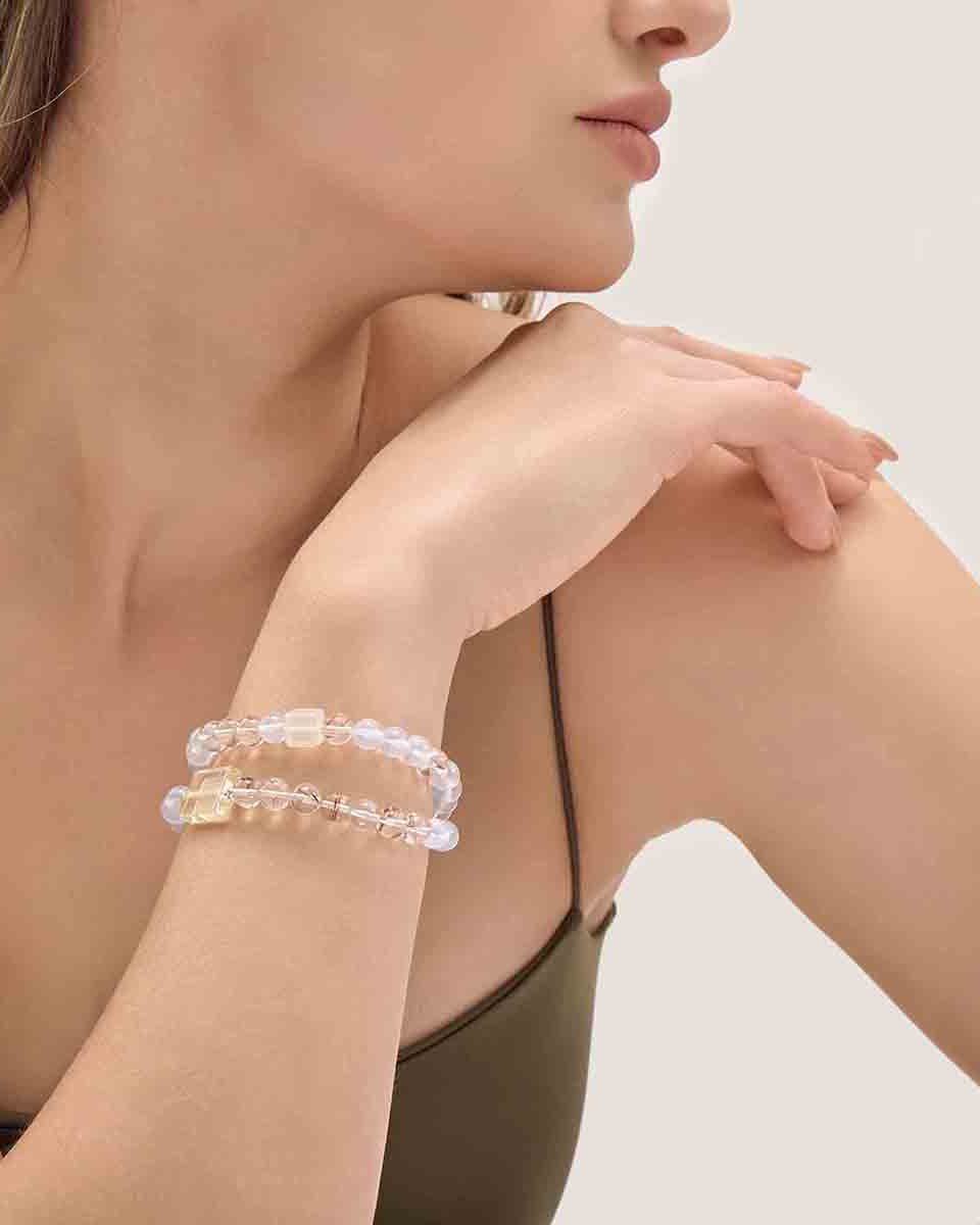 Choodo natural Aquamarine and Clear Quartz crystal resort style double wrap bracelet worn on a model's wrist, creating a premium coastal chic jewelry fashion look.