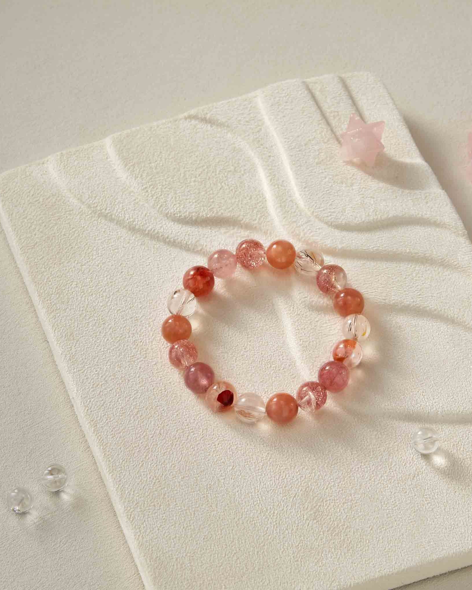 Beaded bracelet on a textured white surface
