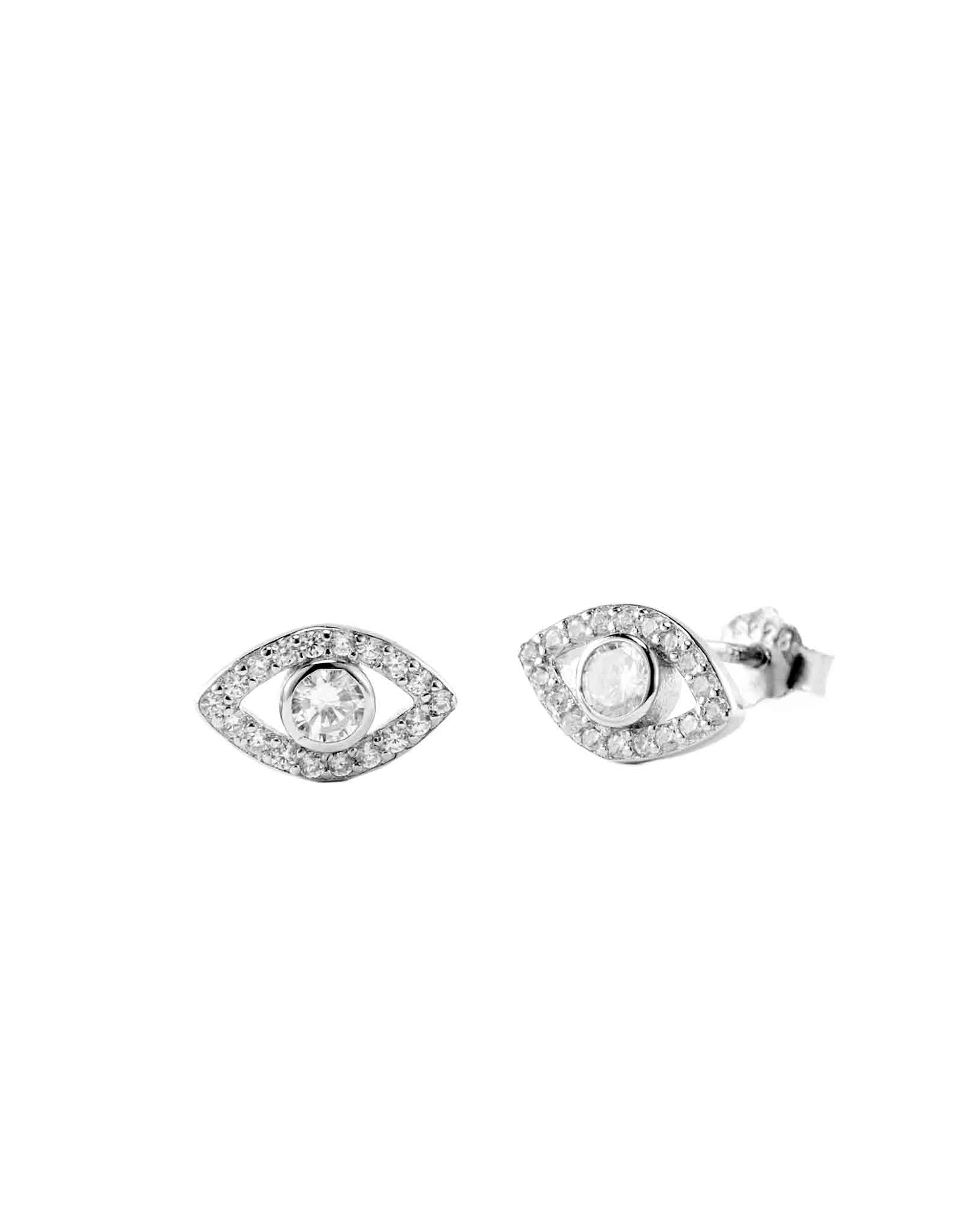 Pair of silver earrings with clear gemstones on a white background