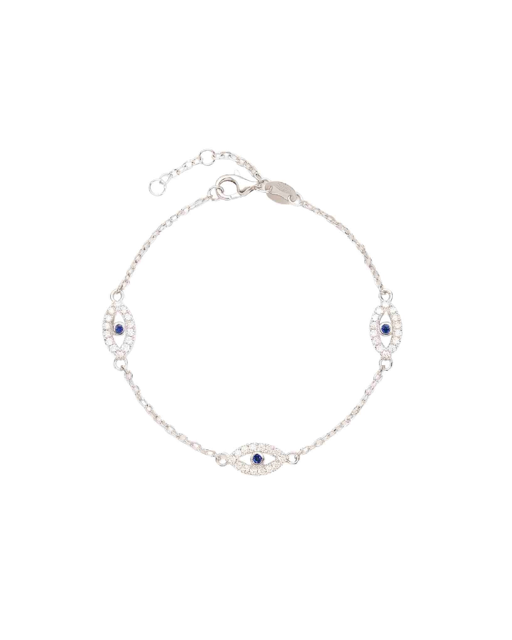 Silver bracelet with blue gemstones on a white background