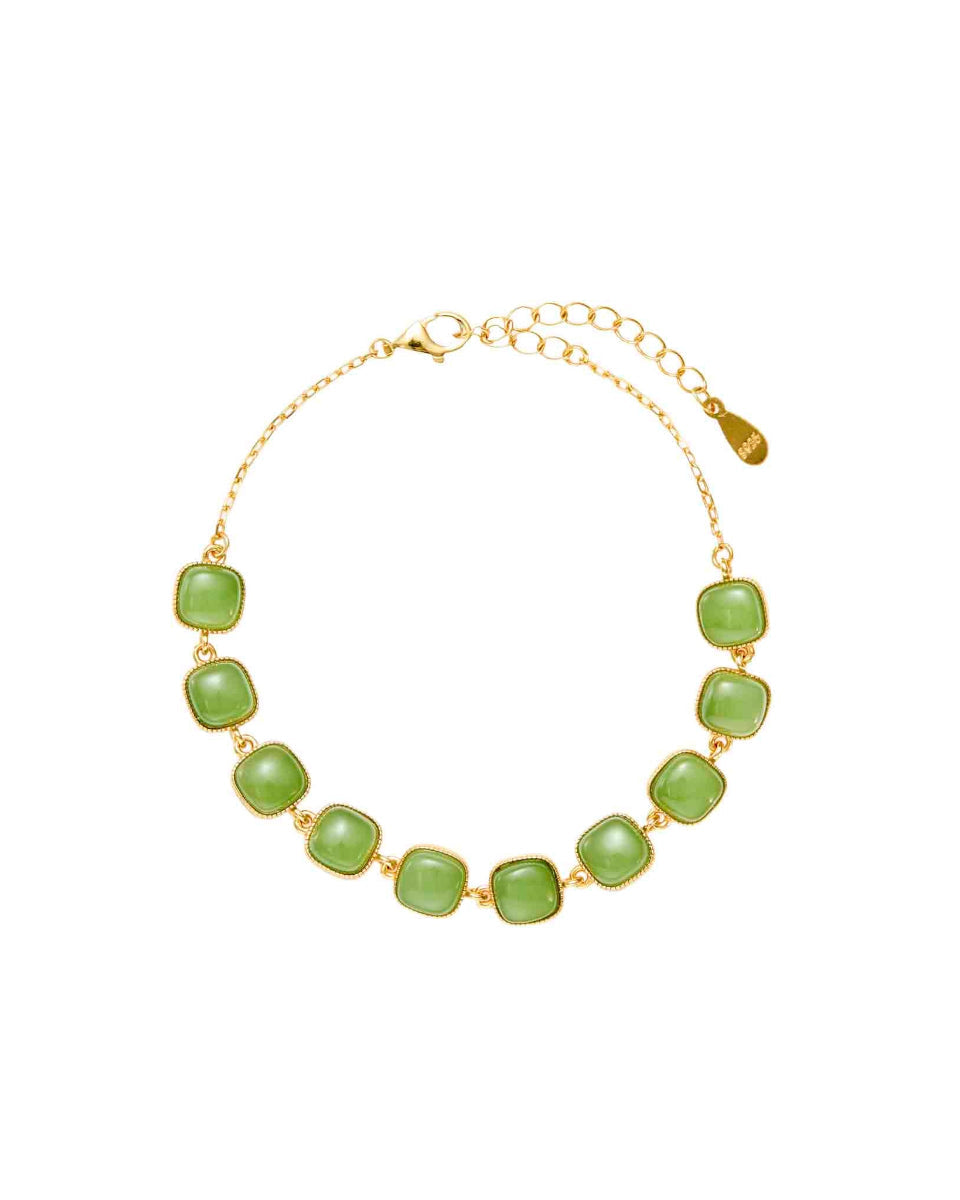 Choodo TrueNorth genuine natural green Jade square charm bracelet in 925 sterling silver geometric settings, minimalist fine jewelry shot on a pure white background.